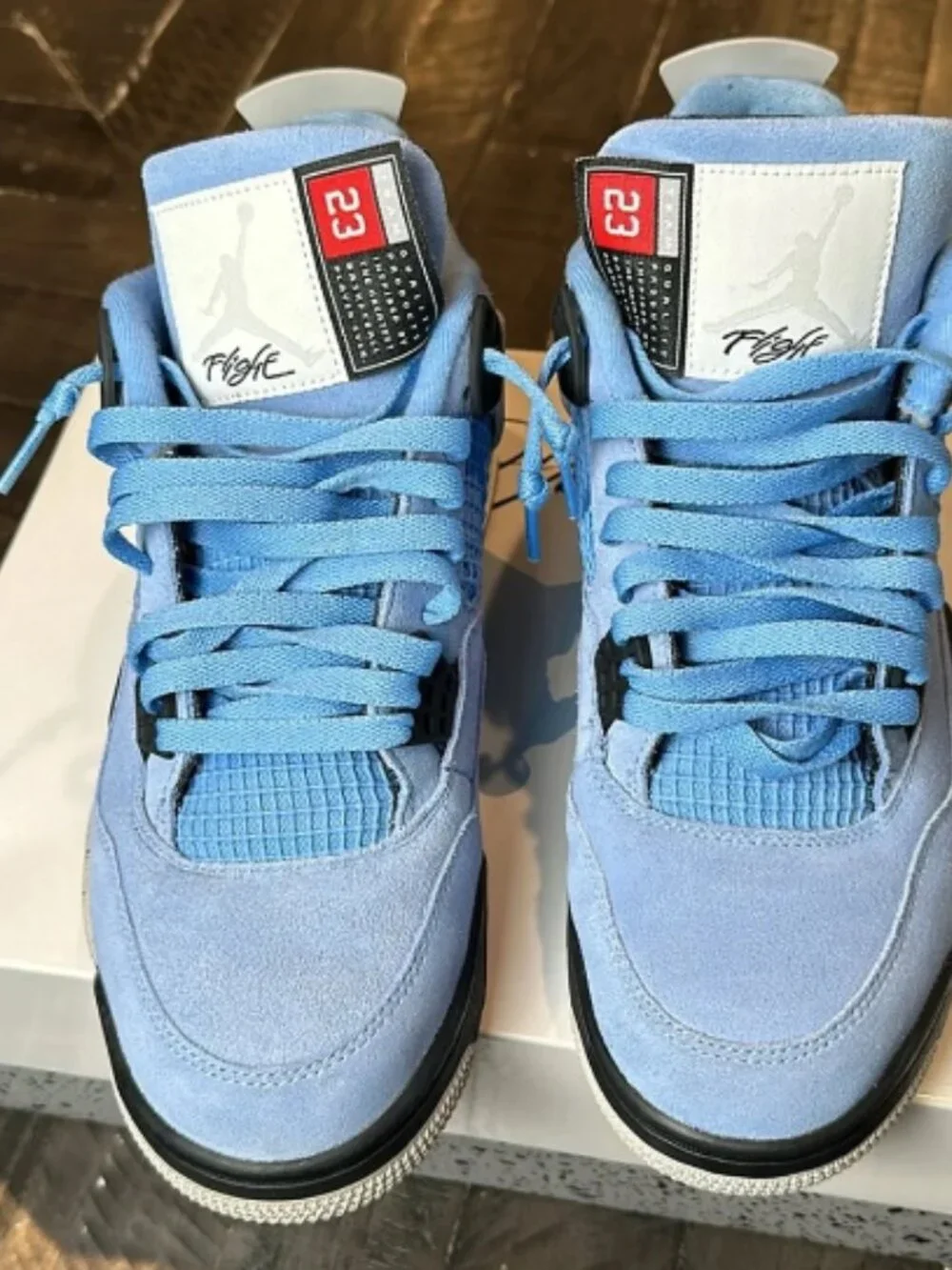 Jordan 4 Retro University Blue Sneakers